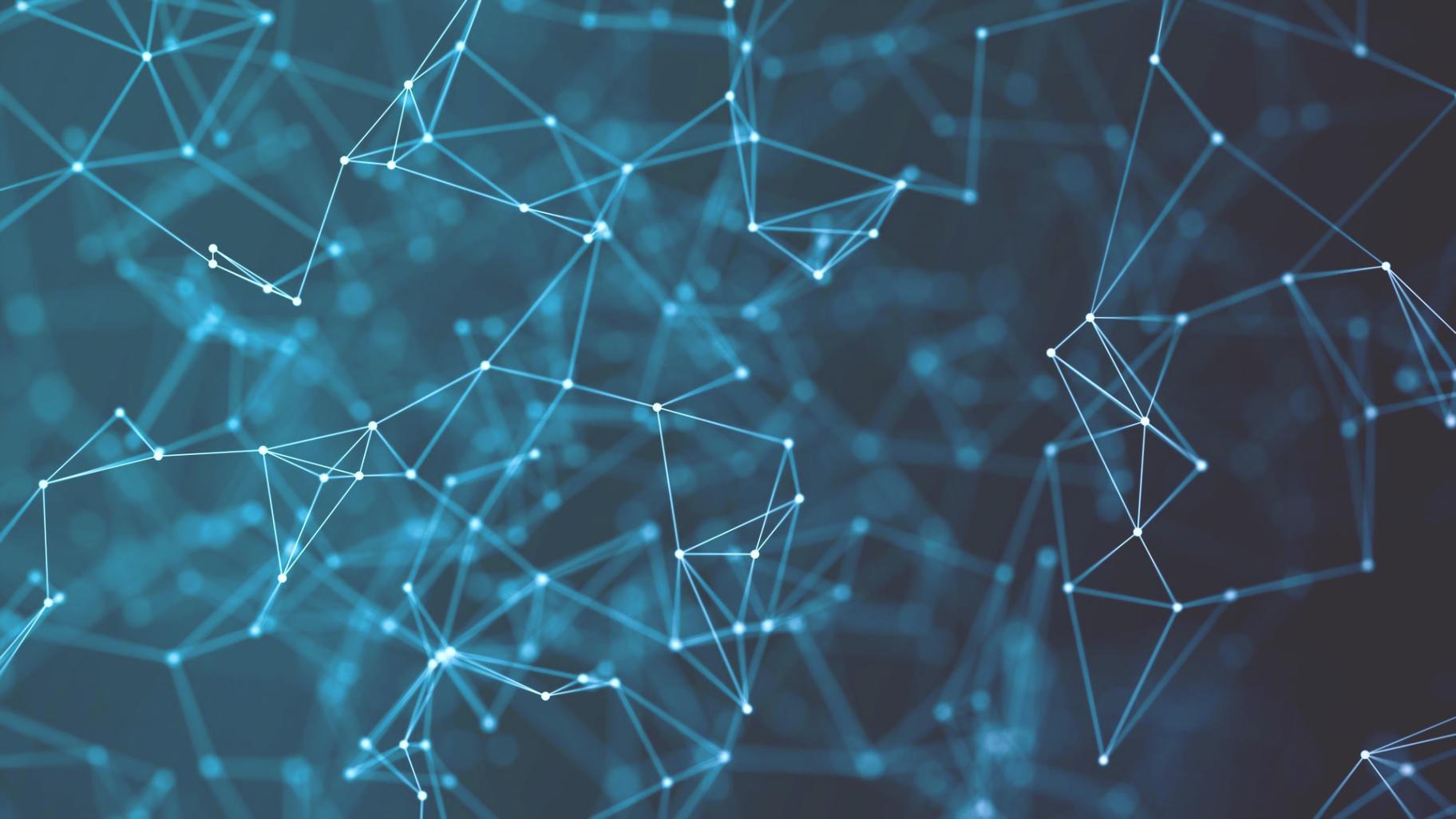 Students collaborating on neural network projects in modern learning environment